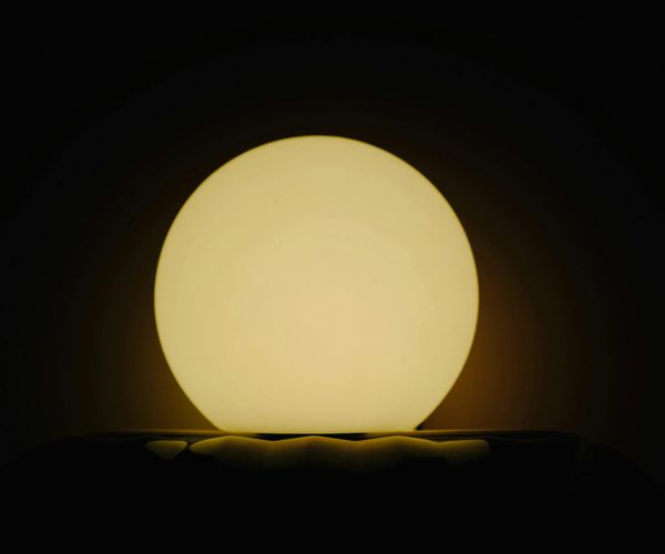 Minimalist glowing sphere representing core stability